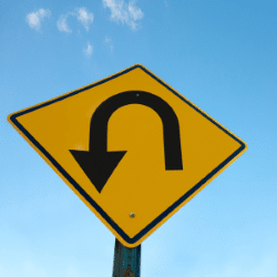 Traffic sign showing U-turn, similar to how lifestyle changes that address what causes metabolic syndrome can reverse metabolic syndrome
